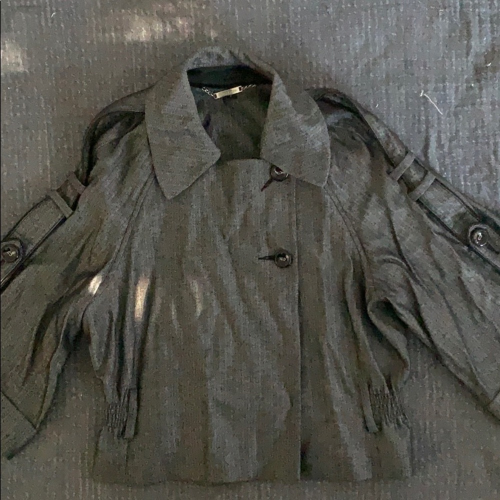 Grayish black flare sleeve coat.